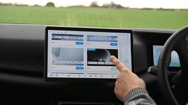 Auto Express senior road test editor Dean Gibson using the BYD Atto 2's infotainment system 