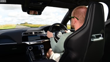 Auto Express chief reviewer Alex Ingram driving the facelifted Jaguar I-Pace
