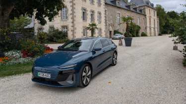 Audi A6 Avant e-tron parked outside a French chateau