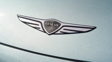 Genesis GV60 - badge