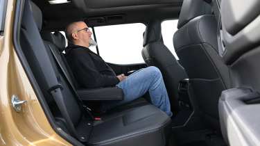 Auto Express senior test editor Dean Gibson sitting in the Toyota Land Cruiser&#039;s back seat