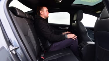 2023 Jaguar XE - rear seats with Auto Express senior writer Alastair Crooks