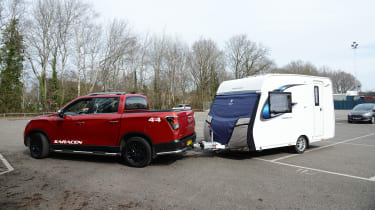 Caravan towing lesson - Ssangyong Musso cornering with caravan attached