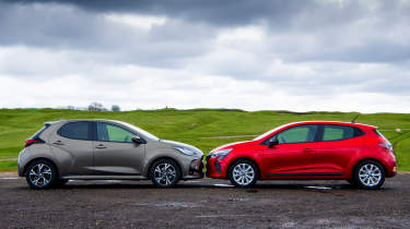 Toyota Yaris vs Renault Clio E-Tech - side shot