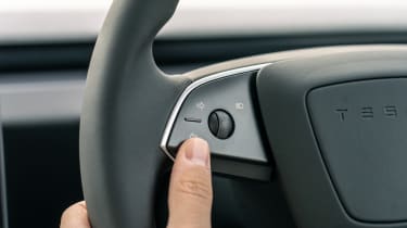 Tesla Model 3 - steering wheel indicator buttons