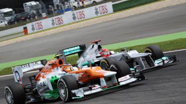 Nico Hulkenberg and Michael Schumacher battle