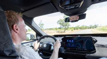 Phil McNamara driving the BMW iX3 prototype