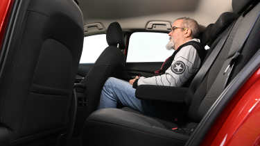 Auto Express senior road test editor Dean Gibson sitting in the Mazda CX-30&#039;s back seat