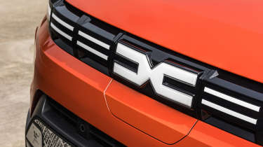 Dacia Spring - Dacia badge