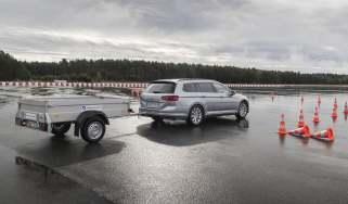 Volkswagen Trailer Assist being demonstrated on a test track with a Volkswagen Passat 