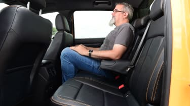 Auto Express senior test editor Dean Gibson sitting in the back of the Ford Ranger