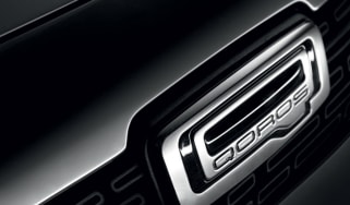 Qoros badge