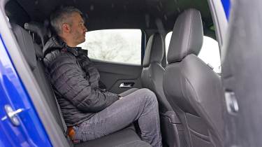 Vauxhall Mokka Electric - rear seats with Auto Express Deputy Editor, Richard Ingram