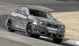 New BMW iX5 M at the Nurburgring - front cornering 