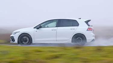 Volkswagen Golf R - side profile in the rain