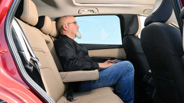 Auto Express senior test editor Dean Gibson sitting in the Mazda CX-5's rear seat