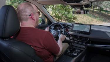 Auto Express news reporter Ellis Hyde driving the Nissan X-Trail