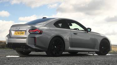 New BMW M2 being driven in the UK - rear static 