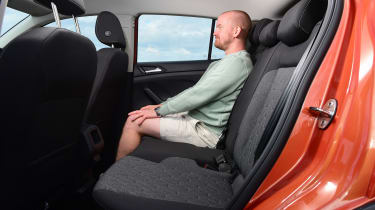 Auto Express chief reviewer Alex Ingram sitting in the back of the Volkswagen T-Cross Move