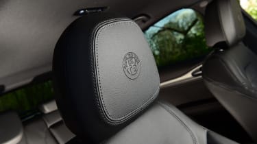 Alfa Romeo Stelvio - front seat headrest